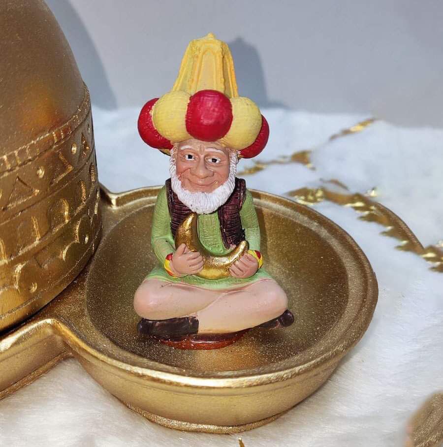 تمرية فنانيس فخار مطلي باللون الذهبي