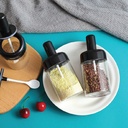 طقم توابل دوار 7 قطع بحامل بمعالق وفرشة للزيت لسهولة الاستخدام