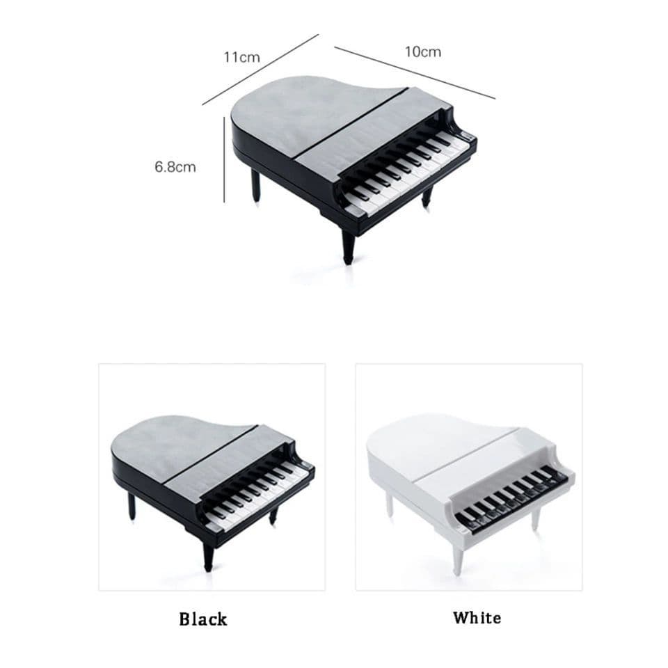 شوك فاكهة وزلابية على حافظة بشكل بيانو