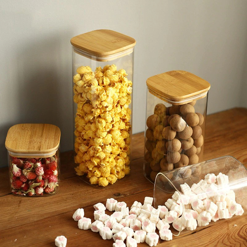 طقم برطمانات زجاجي مربع الشكل 3 قطع باحجام مختلفة لحفظ وتخزين الحبوب والبقوليات والتوابل بغطاء خشبي