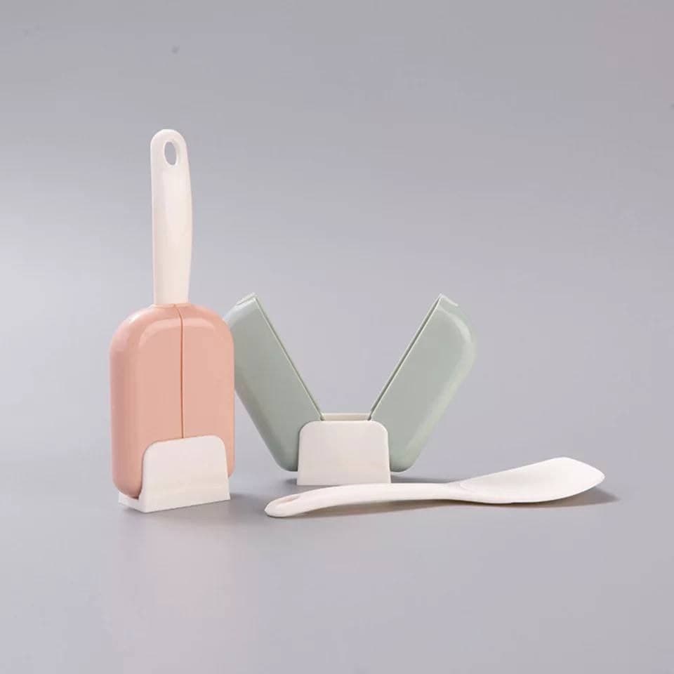 معلقة تقليب الطعام أثناء الطهي بغطاء ذكي للحفاظ على نظافة المكان