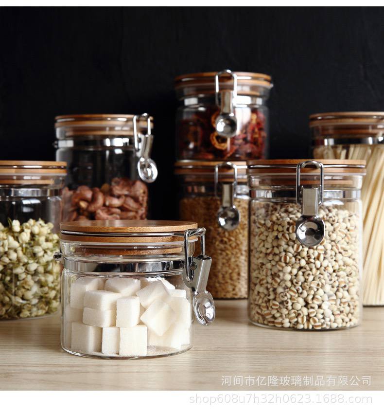 طقم برطمانات زجاجي 3 قطع باحجام مختلفة بغطاء خشبي محكم الغلق لحفظ وتخزين الشاي والسكر والحبوب والبقوليات
