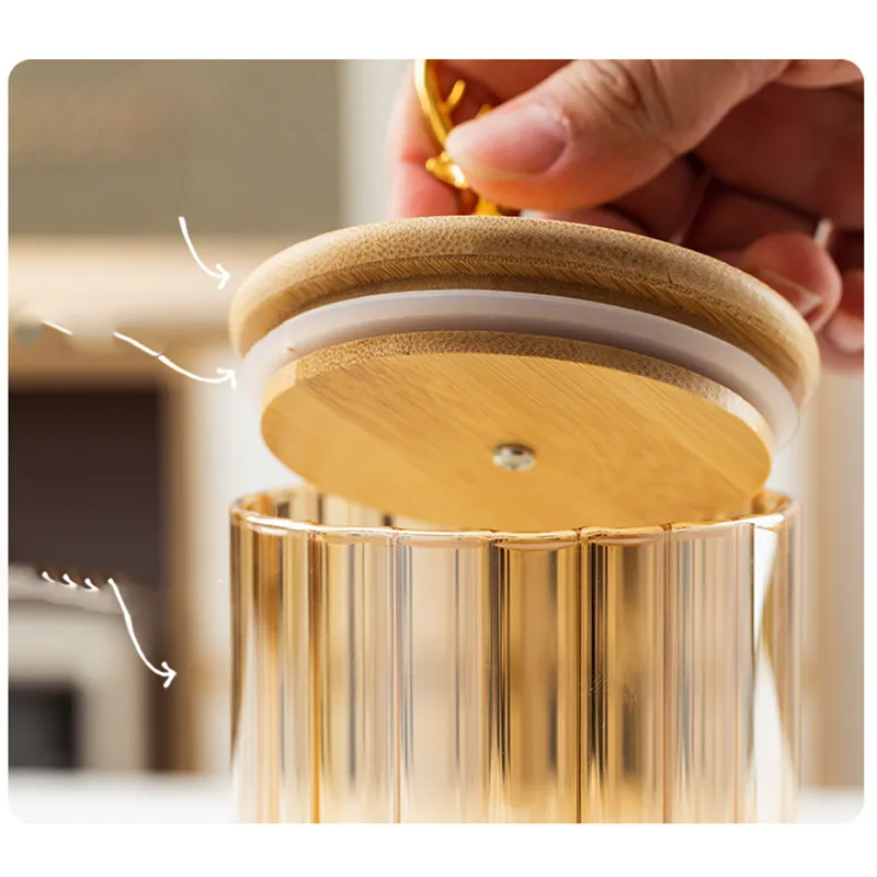 طقم برطمانات زجاج مطلي باللون العسلي 3 قطع باحجام مختلفة بغطاء خشبي بغزالة لحفظ وتنظيم الحبوب والبقوليات والتوابل