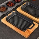 مقلاة  جريل من الحديد الزهر  بيد  مع قاعدة خشب علي شكل مستطيل غير لاصقه