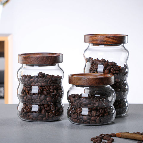 طقم برطمانات زجاج قطعتين باحجام مختلفة وغطاء خشبي محكم الغلق لحفظ وتخزين الحبوب والبقوليات والتوابل