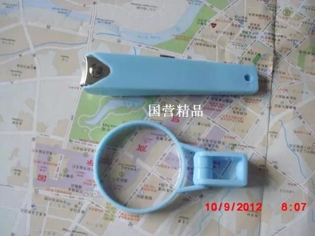 قصافة أظافر بعدسة مكبرة ومبرد