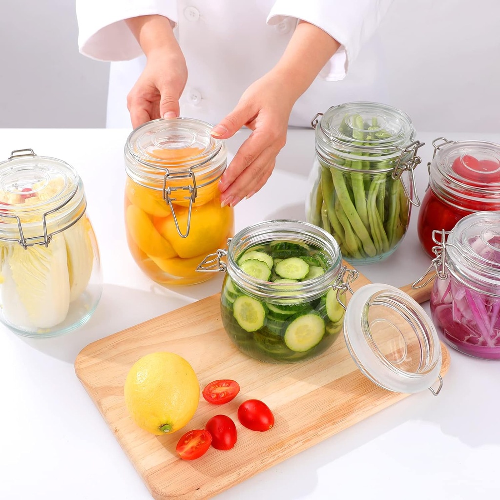 برطمان زجاجي شفاف  بغطاء ومشبك محكم الغلق نصف لتر لحفظ وتخزين المخللات والعسل والسكر