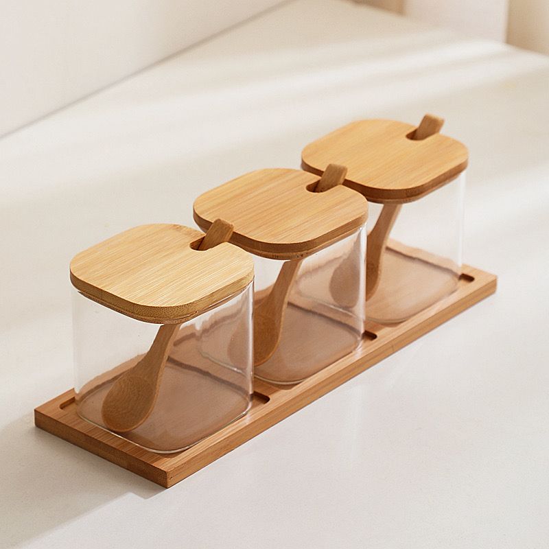 طقم برطمانات زجاج 3 قطع بحامل خشبي ومعلقة لسهولة الأستخدام للتوابل والشاي والسكر والقهوة