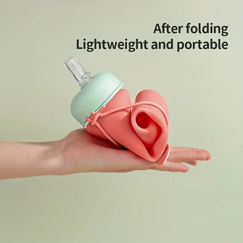 زجاجة مياه سيليكون 600 ملي قابله للطي بميدالية لسهولة الحمل والتعليق