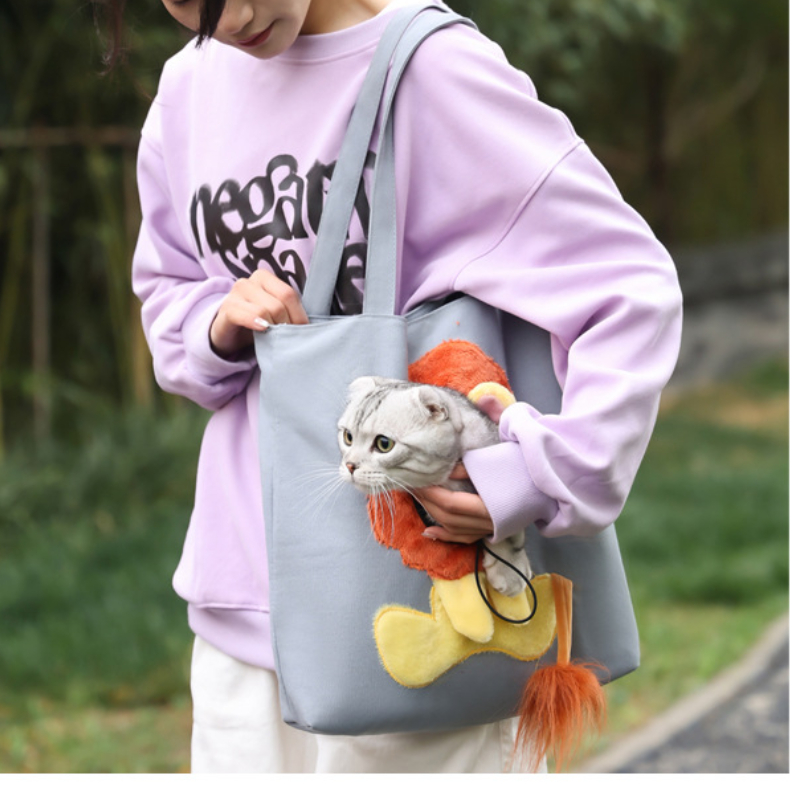 شنطة  كتف لحمل القطط و الكلاب مفرغه من النصف للوجهه و قابله للتضيق اشكال و الوان مختلفة