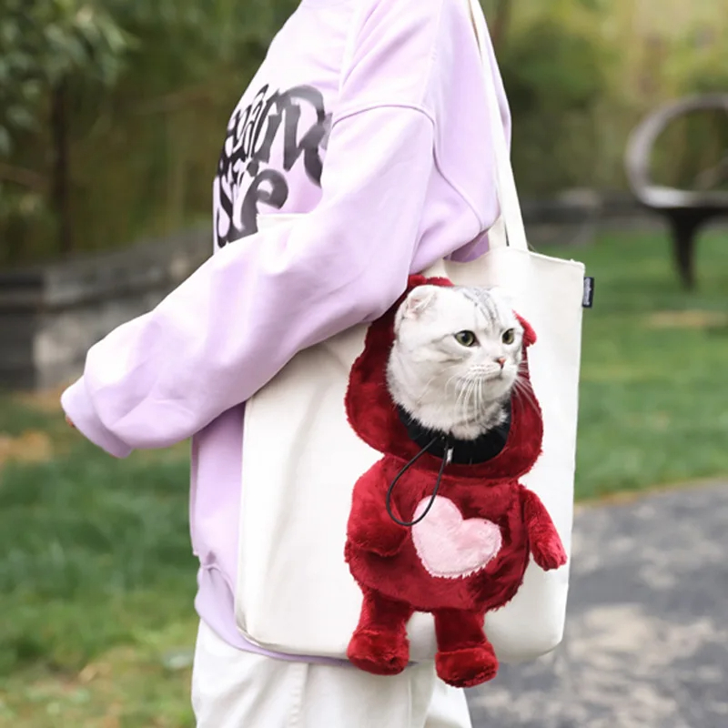 شنطة  كتف لحمل القطط و الكلاب مفرغه من النصف للوجهه و قابله للتضيق اشكال و الوان مختلفة