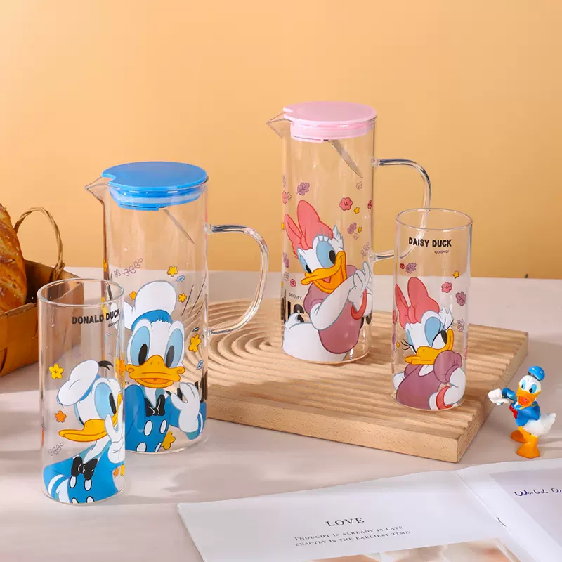 ابريق زجاجي شفاف بمصفاه ستانليس ستيل و بيد وغطاء محكم الغلق علي شكل بطوط 1200 ملي