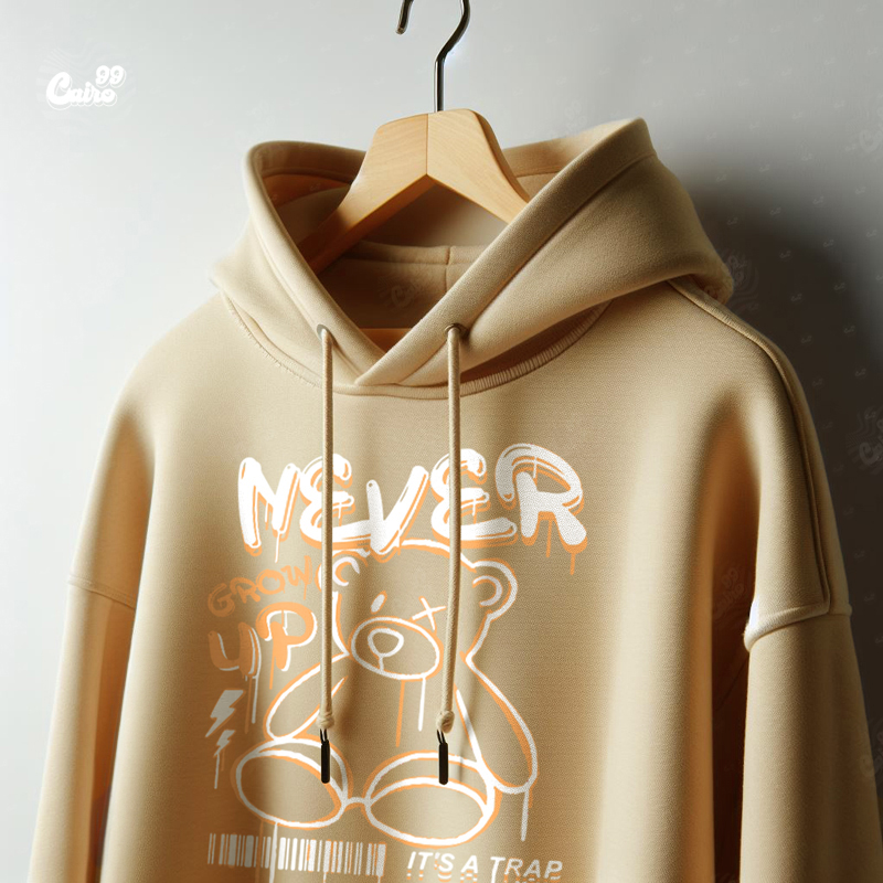 Never Grow Up هودي اوفر سايز قطن باللون البيج