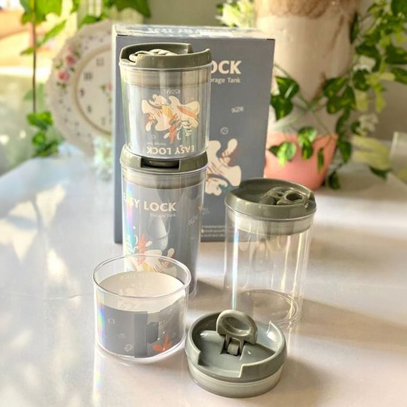 طقم علب اكريلك 4 قطعه محكم الغلق دائري الشكل 4 مقاسات مختلفة لحفظ و تخزين  البقوليات و  الكاندي و الحبوب