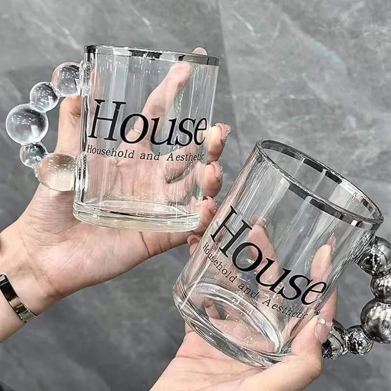 مج بايركس 300 ملي زجاج شفاف و يد علي شكل بابلز باللون السيلفر لشرب العصائر و النسكافيه