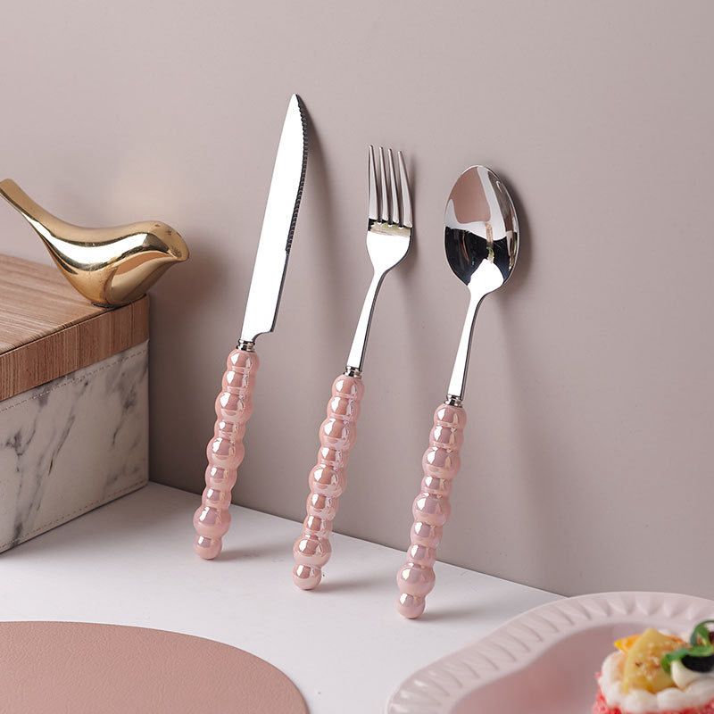 طقم معالق وشوك سكين 6 قطع بمقبض لولي أبيض أنيق