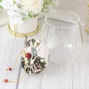 برطمان زجاج شفاف 700 ملي لحفظ البقوليات والمكسرات والكاندي بغطاء محكم الغلق مزين بقماش بورد