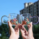 مج دبل جلاس زجاج 220 ملي مزين بقلوب من الداخل مع يد لسهولة الحمل مناسب لشرب القهوة والشاي والعصاير