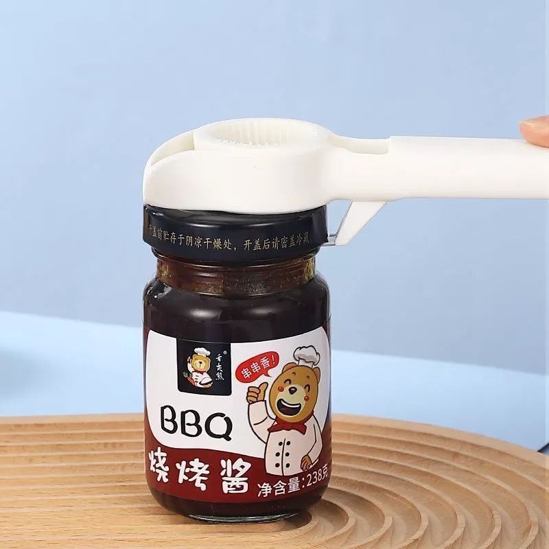 فتاحة 4*1 علي شكل دب لفتح البرطمانات و العلب سهلة الاستخدام و مريحة يمكن حملها باليد بسهولة