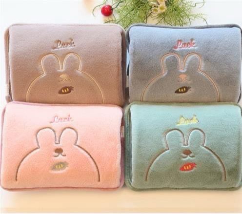 قربة مياه كهربائية لتدفئة البطن والظهر و اليد فرو ناعمه عملية وسهلة الاستخدام