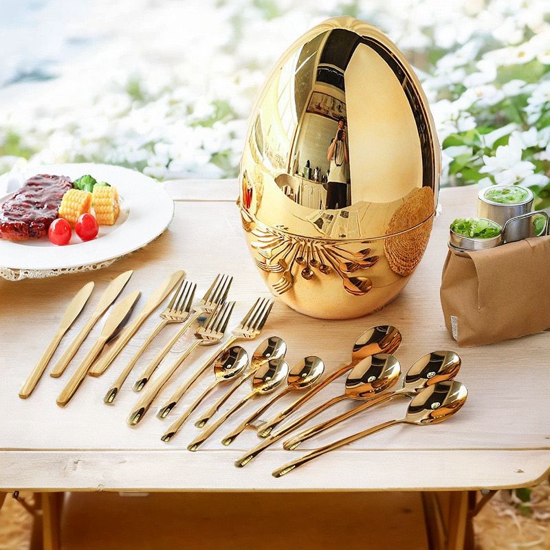 طقم معالق 24 قطعة ستانليس ستيل مع حامل علي شكل بيضة باللون الجولد