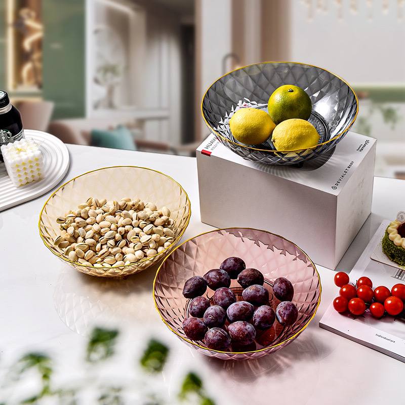 طبق اكيليريك بقاعدة دوارة لحمل وتقديم الفواكه والمكسرات والشوكولاتة للضيوف بشكل شيك