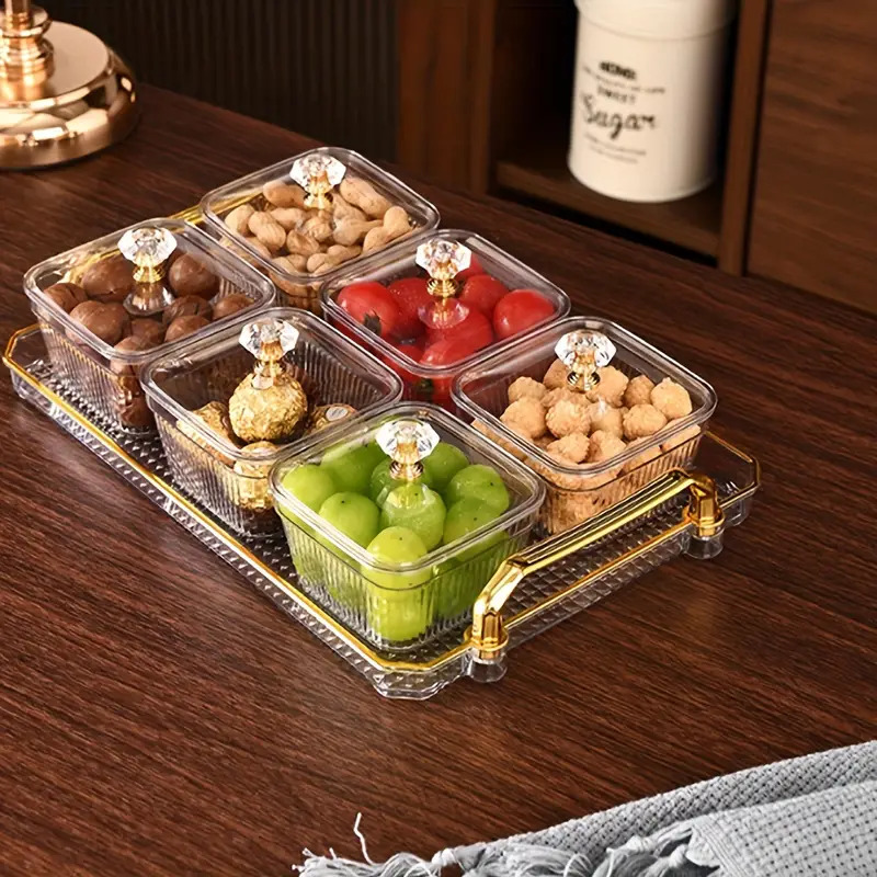 طقم تسالي اكليريك شفاف 6 قطع بغطاء و صينية بيد باللون الجولد لتقديم المكسرات و التمر و الكاندي للضيوف بشكل شيك
