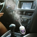 فواحة سيارة دوارة 180 درجة بخزان 50  ملي للتعطير و مخرج لشحن الموبايل