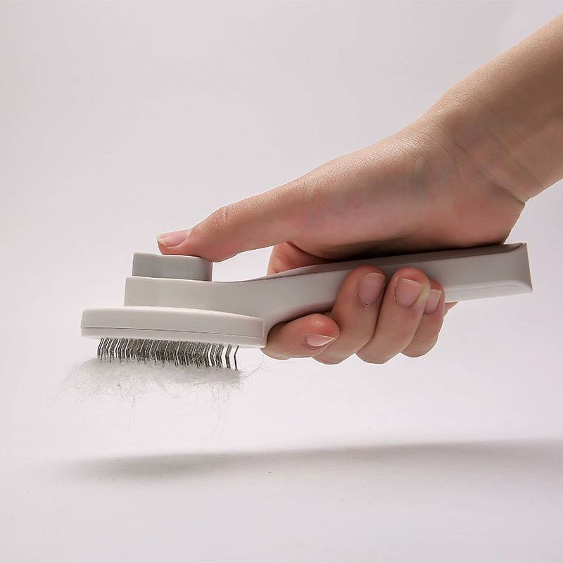 فرشاة تسريح و تنظيف و فك تشابك شعر القطط و الكلاب ذاتية التنظيف من البلاستيك