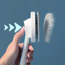 فرشاة تسريح و تنظيف و فك تشابك شعر القطط و الكلاب ذاتية التنظيف من البلاستيك