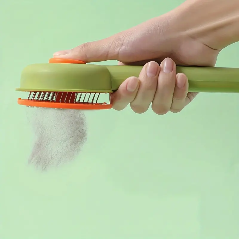 فرشاة تسريح و تنظيف و فك تشابك شعر القطط و الكلاب ذاتية التنظيف من البلاستيك