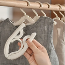 شماعة ملابس بلاستيكية قابلة للطي محمولة لوقت السفر والرحلات