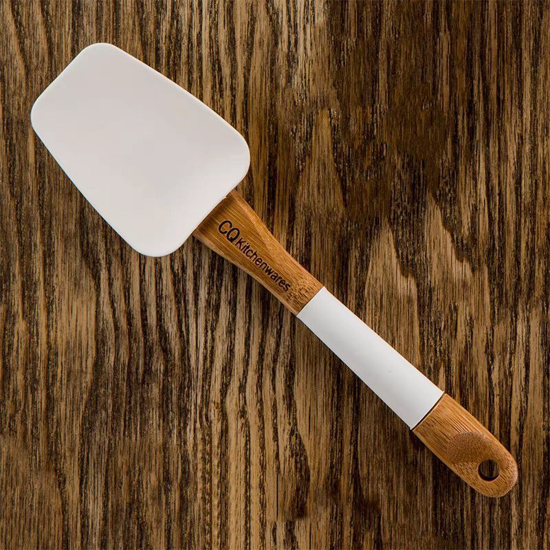 طقم توزيع سيليكون بيد خشب 4 قطع