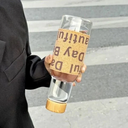 زجاجة مياه 500 ملي بكفر جلد وغطاء خشبي محكم الغلق