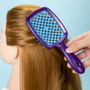 فرشة شعر مفرغة لتسريح وفك تشابك الشعر