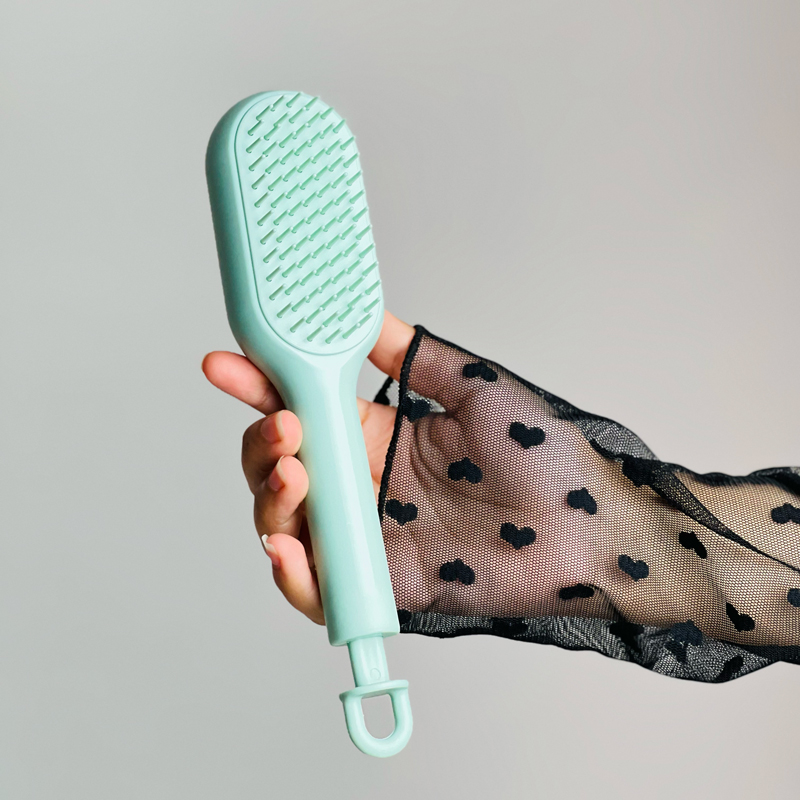 فرشة شعر لفك التشابك ذاتية التنظيف بتصميم قابل للسحب