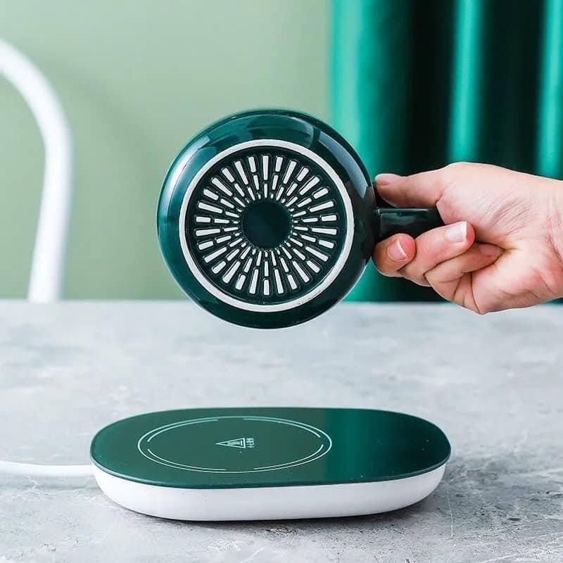 مج بورسلين شيك مع سخان كهربائي ومعلقة للأستمتاع بالقهوة والمشروبات الدافئة في أي مكان