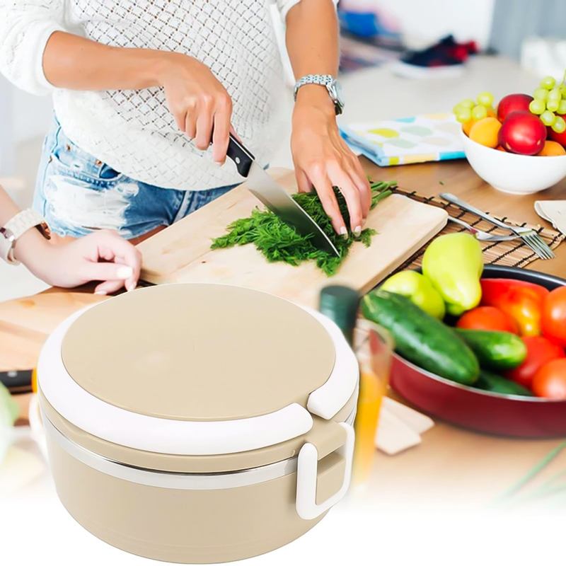 لانش بوكس بحلة استانليس ستيل بغطاء محكم الغلق ومعلقة لسهولة تناول الطعام خارج المنزل بيد