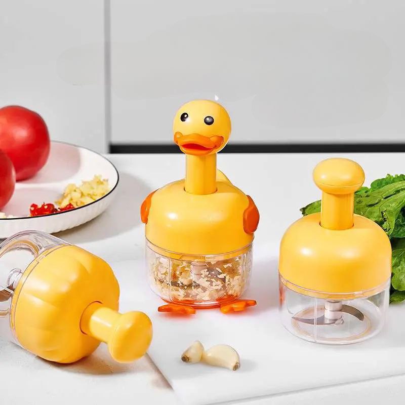 قطاعة ومفرمة يدوية للتوم والبصل والخضروات بشفرات ستاليس من الداخل  شكل بطة