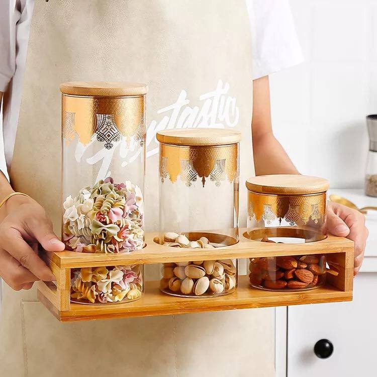 طقم مكسرات وكاندي 3 قطع بمقاسات مختلفة زجاج مزين بالذهبي مع ستاند خشب