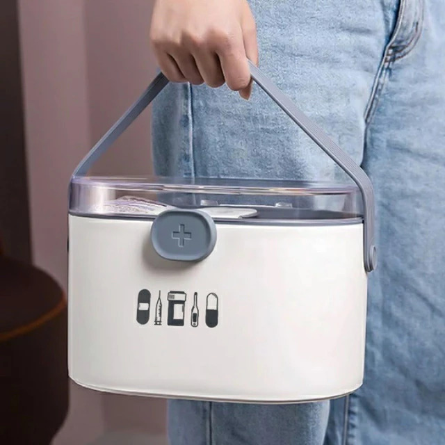 صندوق الاسعافات الاولية ومنظم الادوية بيد لسهولة الحمل