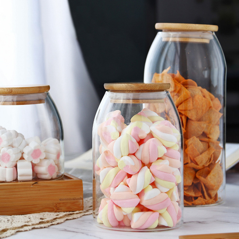 برطمان زجاج  700ملي غطاء خشب محكم الغلق لحفظ وتنظيم البقوليات والتوابل والمكسرات والكورن فليكس ‏