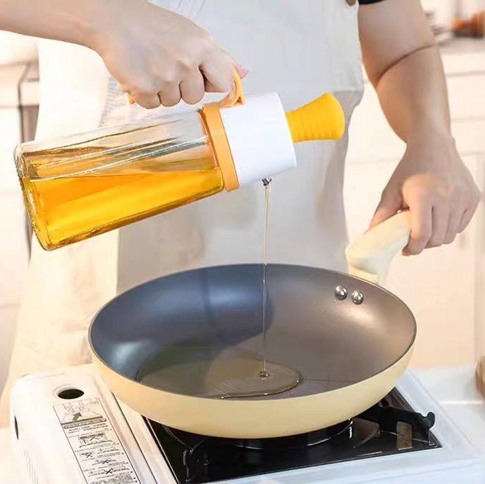 زجاجة زيت 630 ملي بفرشه سيليكون للدهن وتقليل الزيوت وقت الطبخ والشواء بيد لسهولة الحمل