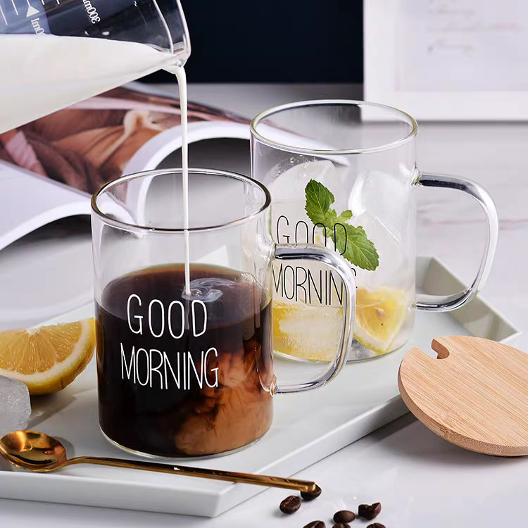 كوباية جود مورنينج 450 ملي لشرب وتقديم العصائر والشاي والنسكافيه من الزجاج الشفاف بيد