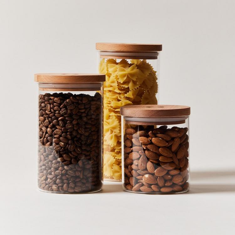 طقم برطمانات اكليريك 3 قطع بمقاسات مختلفة لحفظ وتنظيم الحبوب والتوابل والشاي والسكر بغطاء خشبي محكم الغلق