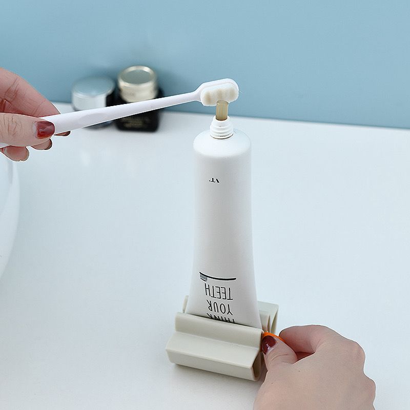ضاغط وحامل أنابيب معجون الأسنان والكريمات والمراهم يدوي سهل الأستخدام